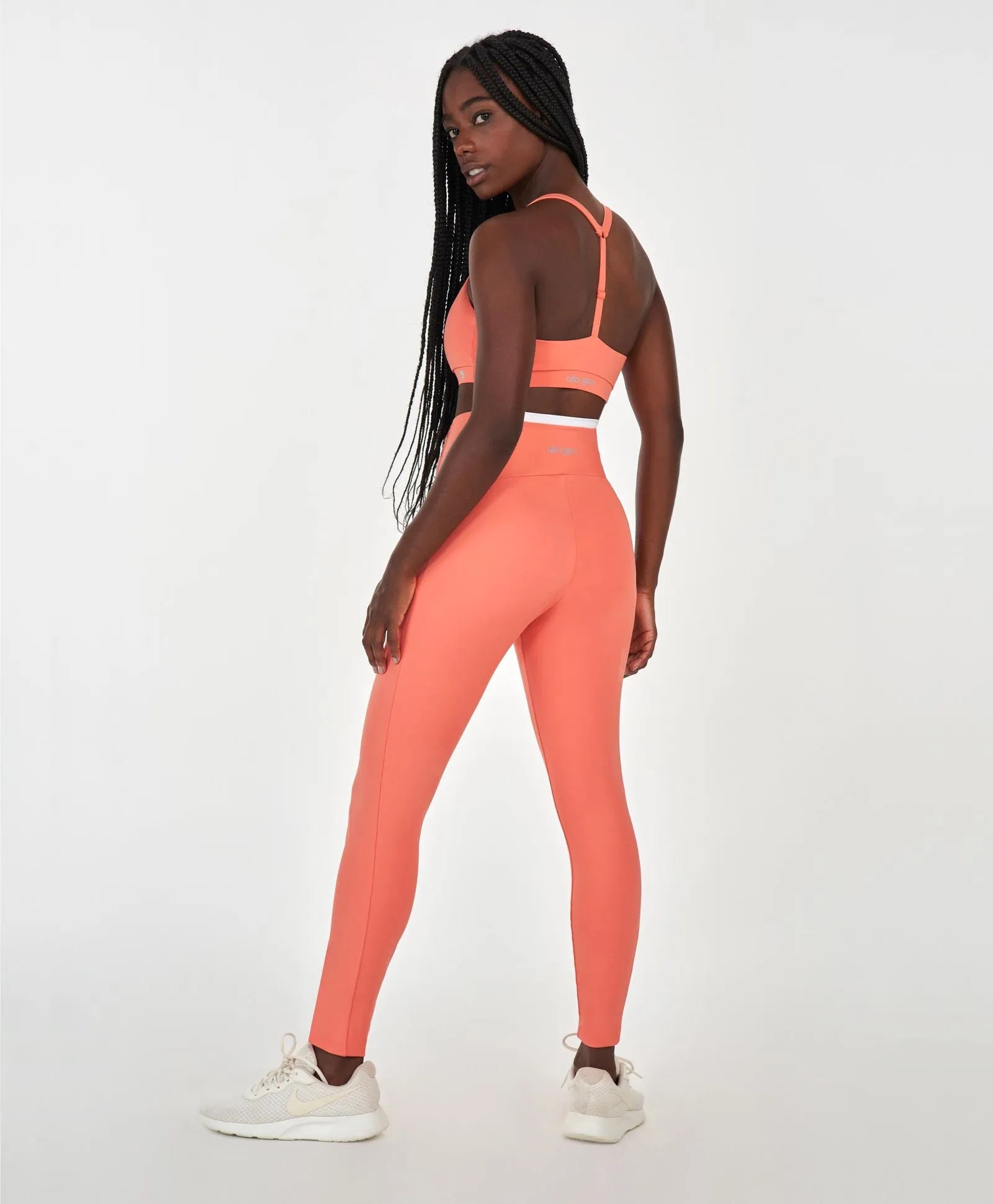 Legging Com Bolsos Coral Alto Giro